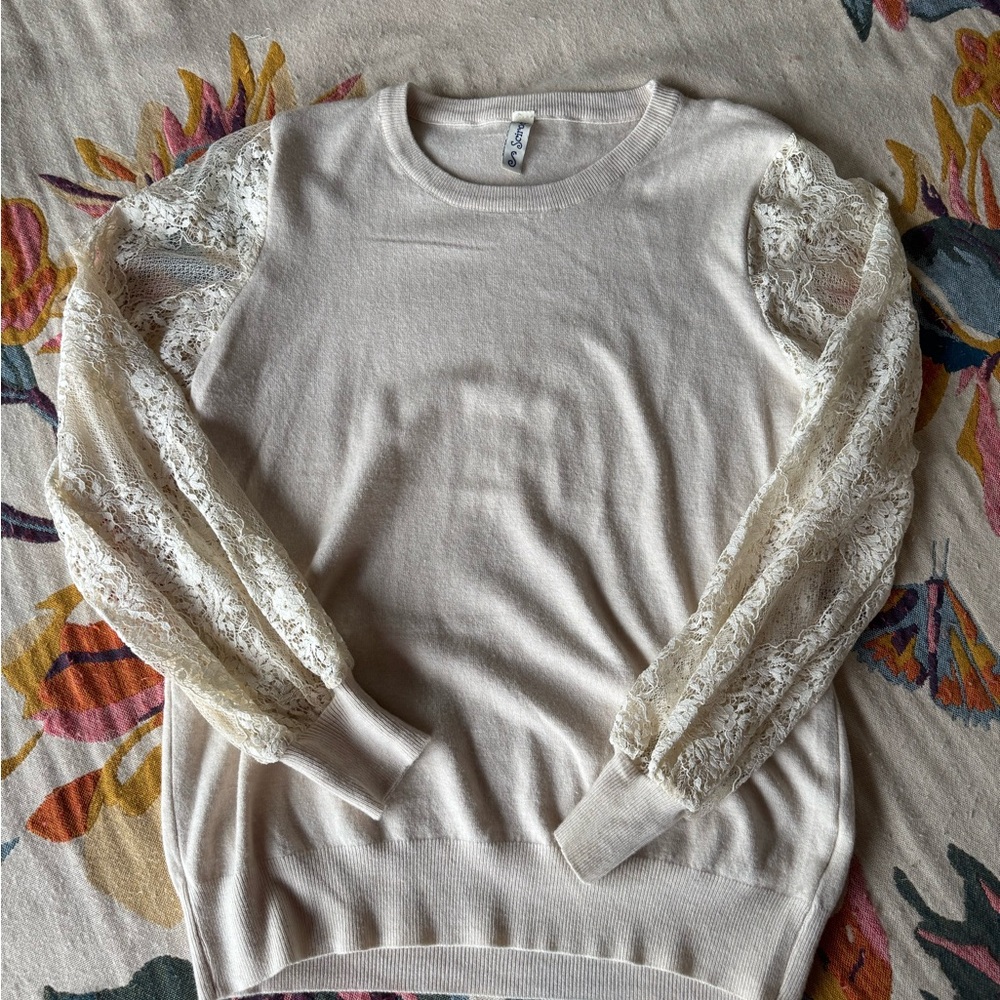 Elegant Cream Sweater with Lace Sleeves